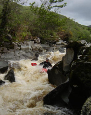 Owenf kayaking on the Flesk River. Kerry, Ireland.