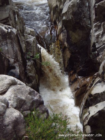  Glenacally River - Innocuous drop looking back upstream. Beware the tow-back and the cave. 