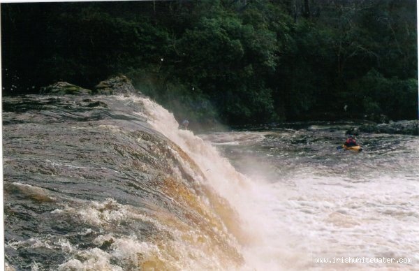  Erriff River - Main drop.Medium level. Paddler visible on RL.Hero line down the middle.