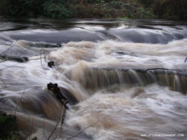  Brosna River - Salmon run just visible above the water in foreground of photo, located on river right at the put in.