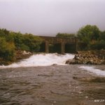 Photo of the Adrigole river in County Cork Ireland. Pictures of Irish whitewater kayaking and canoeing. slide under bridge
mw sept 1998. Photo by dave g