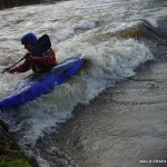  Owennashad River - Matt side surfs the foam pile by the wall on blackwater play wave