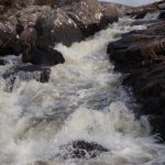 Photo of the Gweebarra river in County Donegal Ireland. Pictures of Irish whitewater kayaking and canoeing. The main grade 4/5 rapid.. Photo by Stu Hamilton