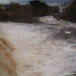 Photo of the Ennistymon Falls in County Clare Ireland. Pictures of Irish whitewater kayaking and canoeing. Looking down from the main falls, high flow.. Photo by rur