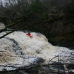 Photo of the Roogagh river in County Fermanagh Ireland. Pictures of Irish whitewater kayaking and canoeing. Eoin Halliday on the Second to last drop, taking the steps. Photo by Conor Daly