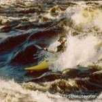 Photo of the Curragower Play Wave in County Limerick Ireland. Pictures of Irish whitewater kayaking and canoeing. Seanie Byrne surfing Gower in a Riot Dom 47.. Photo by Seanie