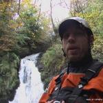 Photo of the Tourmakeady Waterfall in County Mayo Ireland. Pictures of Irish whitewater kayaking and canoeing. Aidan at basr of falls. Photo by Graham Clarke