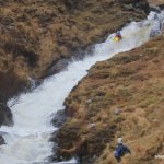 Photo of the Seanafaurrachain river in County Galway Ireland. Pictures of Irish whitewater kayaking and canoeing. Bren Orton boofing onto a rock slap above another big slide. Photo by Barry Loughnane