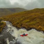 Photo of the Seanafaurrachain river in County Galway Ireland. Pictures of Irish whitewater kayaking and canoeing. David Higgins on another big slide on the bottom half of the river. Photo by Barry Loughnane