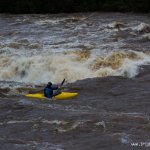 Photo of the Erriff river in County Mayo Ireland. Pictures of Irish whitewater kayaking and canoeing. A big Hole below the bridge at the falls at 3 meters on the gauge. Photo by Barry Loughnane