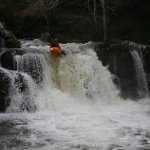 Photo of the Pollanassa (Mullinavat falls) river in County Kilkenny Ireland. Pictures of Irish whitewater kayaking and canoeing. Frank firing it up. Photo by Adrian