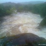 Photo of the Coomeelan Stream in County Kerry Ireland. Pictures of Irish whitewater kayaking and canoeing. Downstream from third bridge, big drops at horizon line. Photo by Daithí