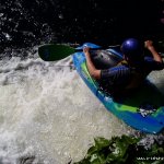 Photo of the Lower Corrib river in County Galway Ireland. Pictures of Irish whitewater kayaking and canoeing. Steve going over Jurys canal drop.. Photo by Eoin Hurst