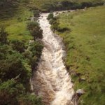 Photo of the Bunhowna river in County Mayo Ireland. Pictures of Irish whitewater kayaking and canoeing. Main slide.Soooooo much fun.Giddy up!. Photo by Graham Clarke