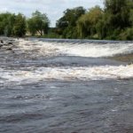 Photo of the Nore river in County Kilkenny Ireland. Pictures of Irish whitewater kayaking and canoeing. Lacken Weir, medium Water. Photo by gringottsgoblin