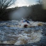 Photo of the Avonmore (Annamoe) river in County Wicklow Ireland. Pictures of Irish whitewater kayaking and canoeing. Paul summers in the first rapid on the lough dan section.. Photo by steve fahy
