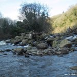 Photo of the Aughrim river in County Wicklow Ireland. Pictures of Irish whitewater kayaking and canoeing. Portage at the man made weir. Photo by steve fahy