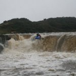 Photo of the Bunduff river in County Leitrim Ireland. Pictures of Irish whitewater kayaking and canoeing. Mark taylor boofing. Photo by Conor Daly
