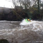 Photo of the Upper Eany More river in County Donegal Ireland. Pictures of Irish whitewater kayaking and canoeing. fast shallow wave at bottom off first slide. paddler; Lee Doherty Letterkenny IT Canoe Club (LYIT CC). Photo by Lee Doherty