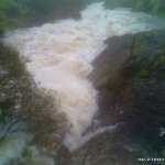 Photo of the Coomeelan Stream in County Kerry Ireland. Pictures of Irish whitewater kayaking and canoeing. Down stream from first bridge, waterfall is at horizon zine. Photo by Daithí