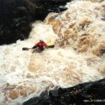 Photo of the Avonmore (Annamoe) river in County Wicklow Ireland. Pictures of Irish whitewater kayaking and canoeing. Sean Mc racing Jacksons many years before boatercross!!!. Photo by Ian